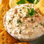 Delicious smoked tuna dip recipe served with crackers and vegetable sticks