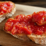 Pan con tomate recipe on rustic wood background
