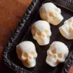 Homemade mozzarella cheese skulls ready for a Halloween party