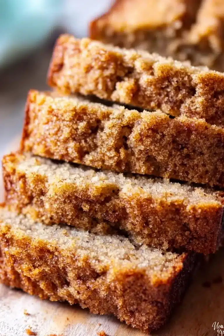 Moist coffee cake banana bread with bananas and cinnamon topping