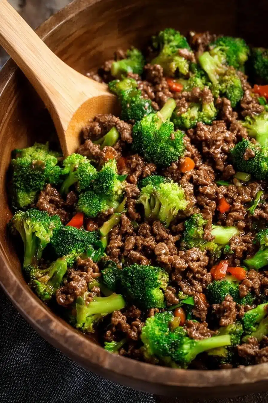 Ground beef and broccoli stir-fry served in a bowl, showcasing vibrant veggies and protein.