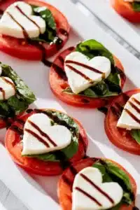 Valentine's Heart Caprese salad with basil and mozzarella in heart shape
